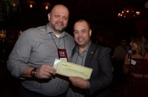 empresários posam para foto durante o 2º Jantar de Negócios